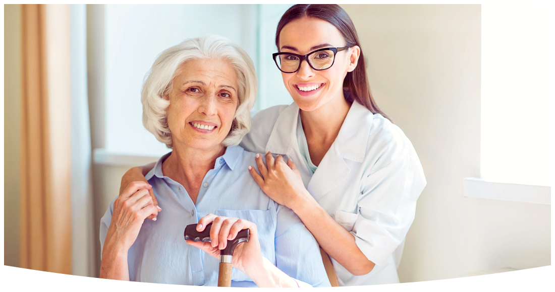 Smiling and cheerful senior women with her kind nurse